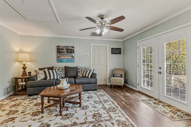 a living room with furniture and a rug