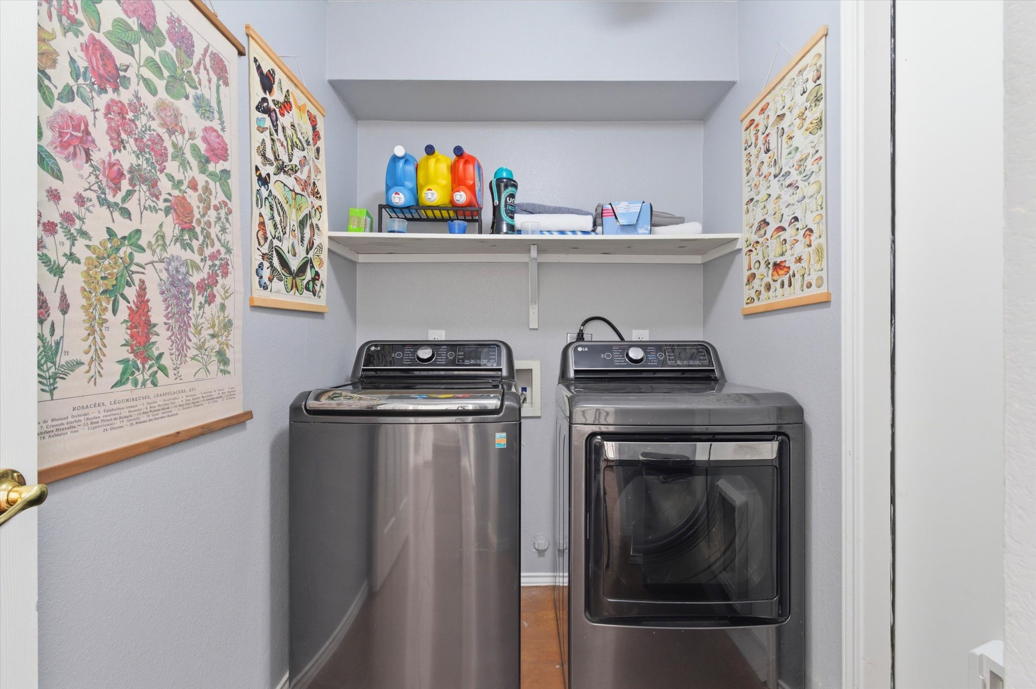 8920 West Hove Loop Austin, TX 78749 - Photo 21 of 39 Dedicated laundry area featuring a built-in shelf above the appliance space