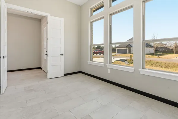 a view of an empty room and window