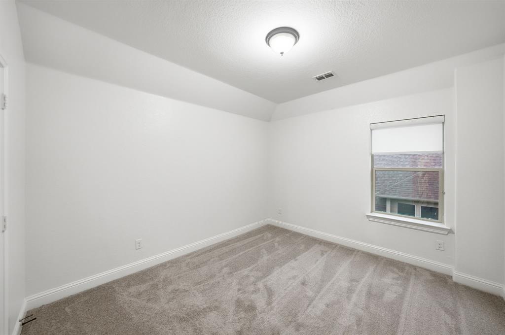 624 Sorrell Road McKinney, TX 75072 - Photo 21 of 28 an empty room with a window