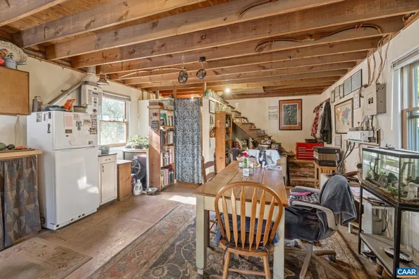 a view of a chairs and table in a patio
