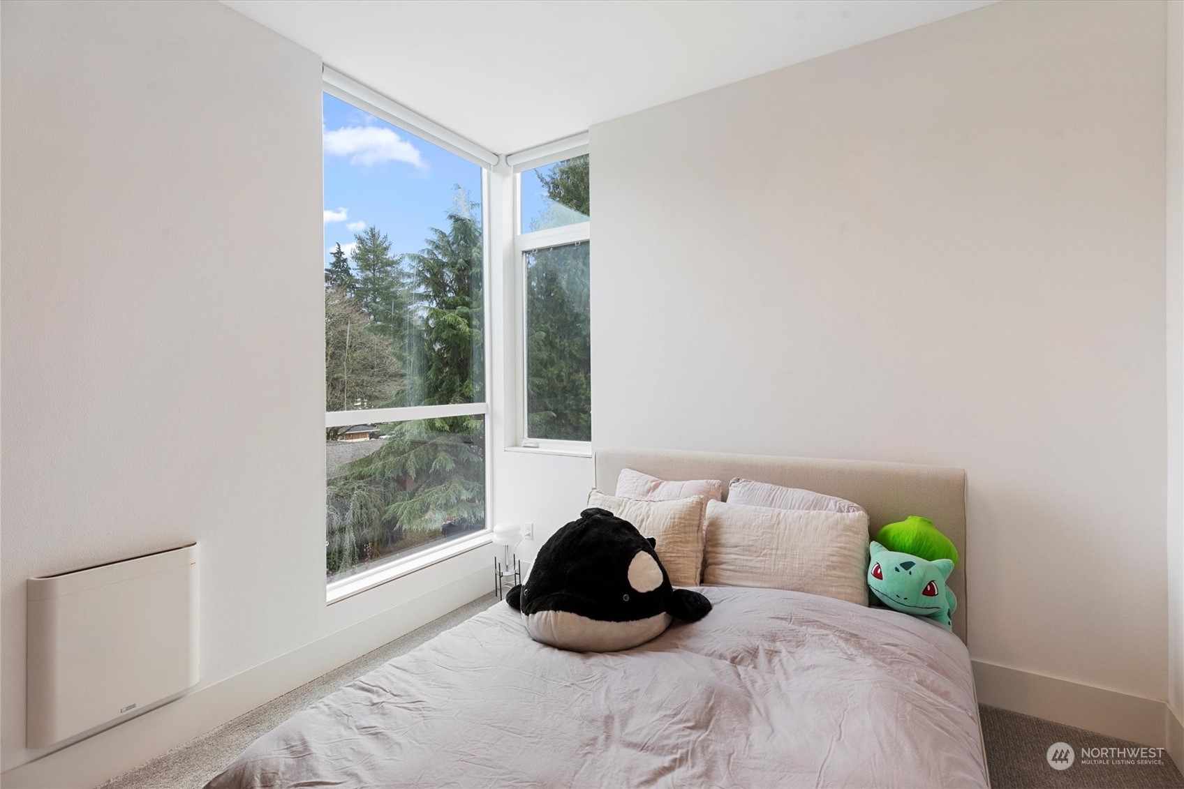 375 3rd Place Northwest Issaquah, WA 98027 - Photo 13 of 24 a bedroom with a bed and a window
