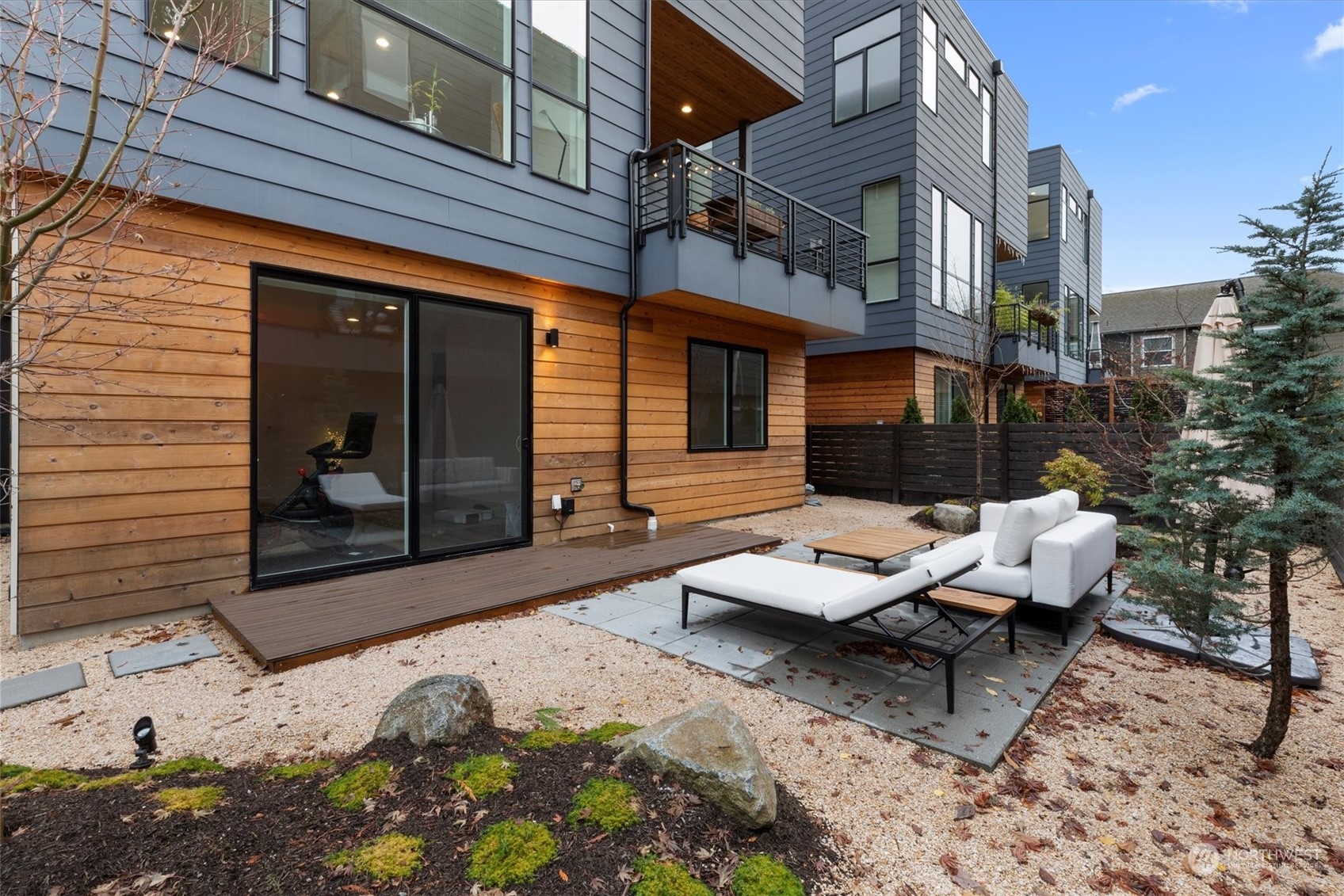 375 3rd Place Northwest Issaquah, WA 98027 - Photo 6 of 24 a wooden bench sitting in front of a building