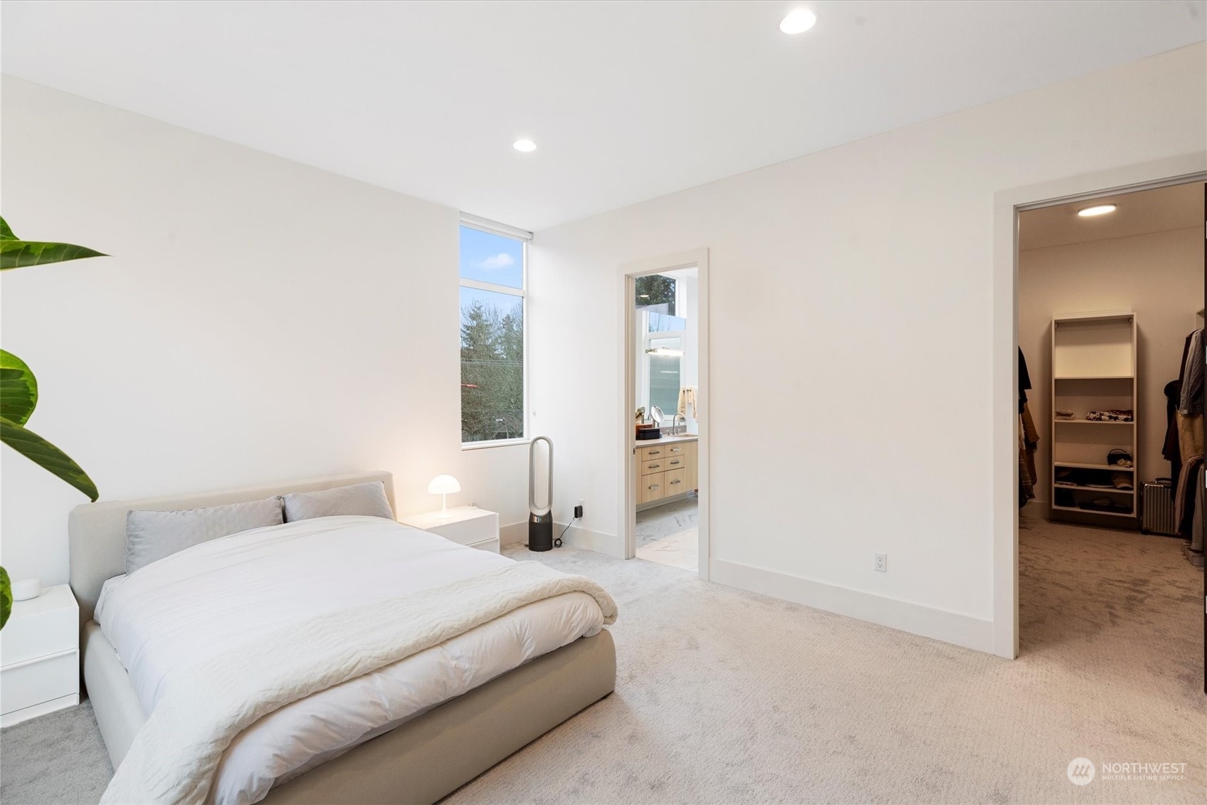 375 3rd Place Northwest Issaquah, WA 98027 - Photo 10 of 24 a bedroom with a bed and a view of bathroom