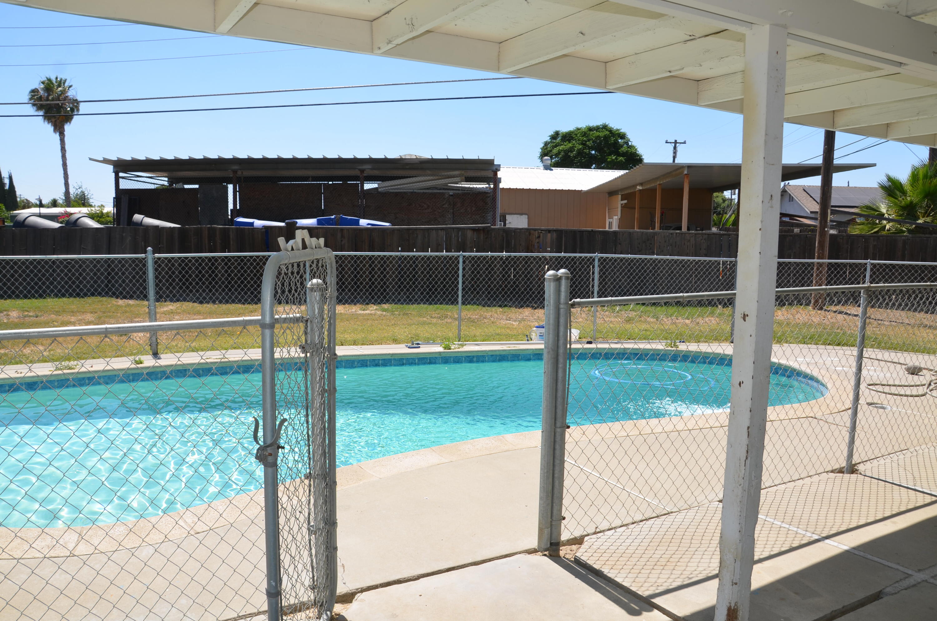 339 West Spring Lane Lemoore, CA 93245 - Photo 27 of 31 a view of a backyard