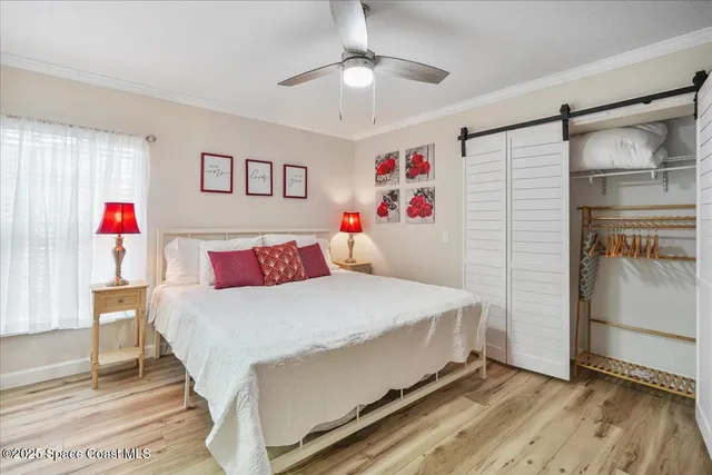 a bathroom with a granite countertop sink a mirror and shower