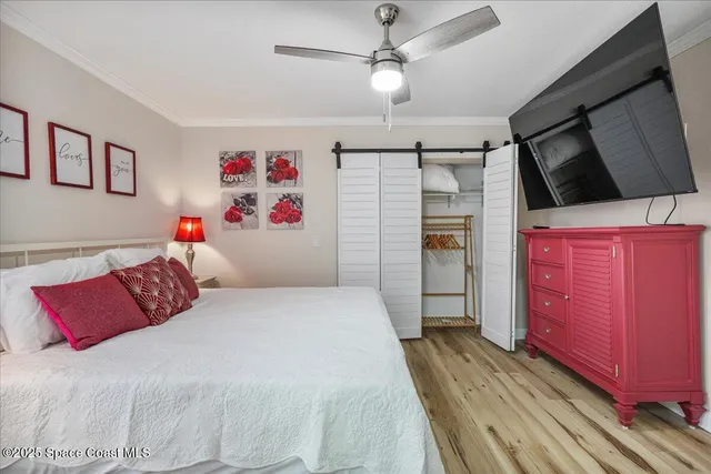a bathroom with a granite countertop sink a mirror and shower