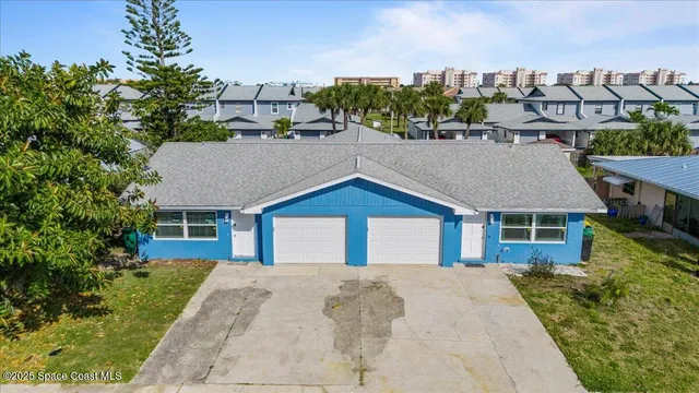 a house view with a garden space
