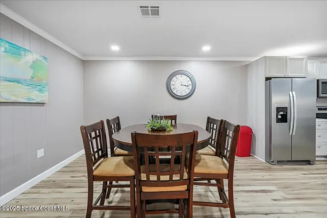 a house with a tree in front of it