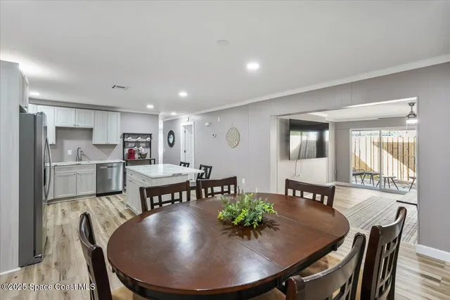 an aerial view of residential building and ocean