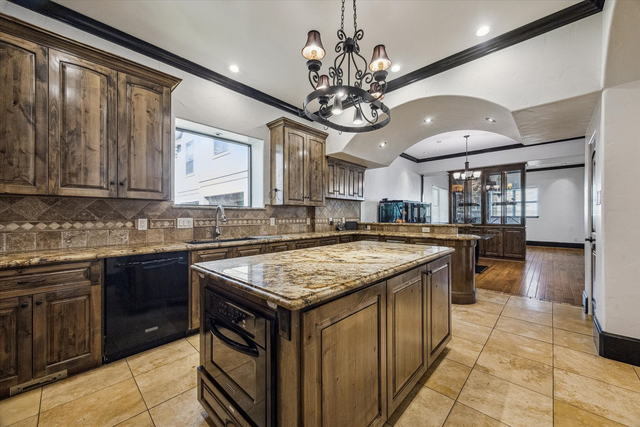 4119 Allen Street Houston, TX 77007 - Photo 17 of 49 a kitchen with a counter space cabinets and stainless steel appliances