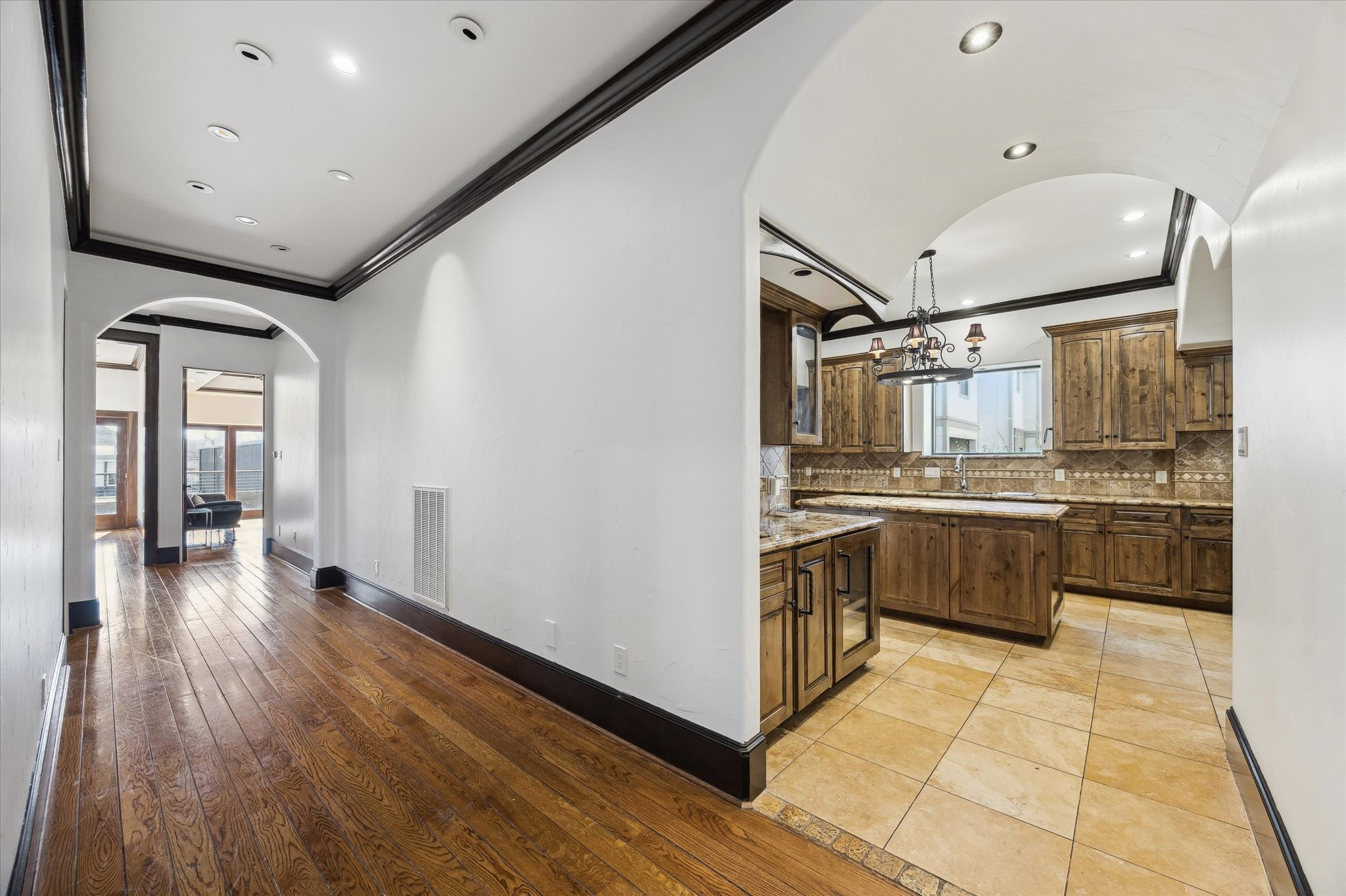 4119 Allen Street Houston, TX 77007 - Photo 23 of 49 a kitchen with stainless steel appliances sink refrigerator and microwave