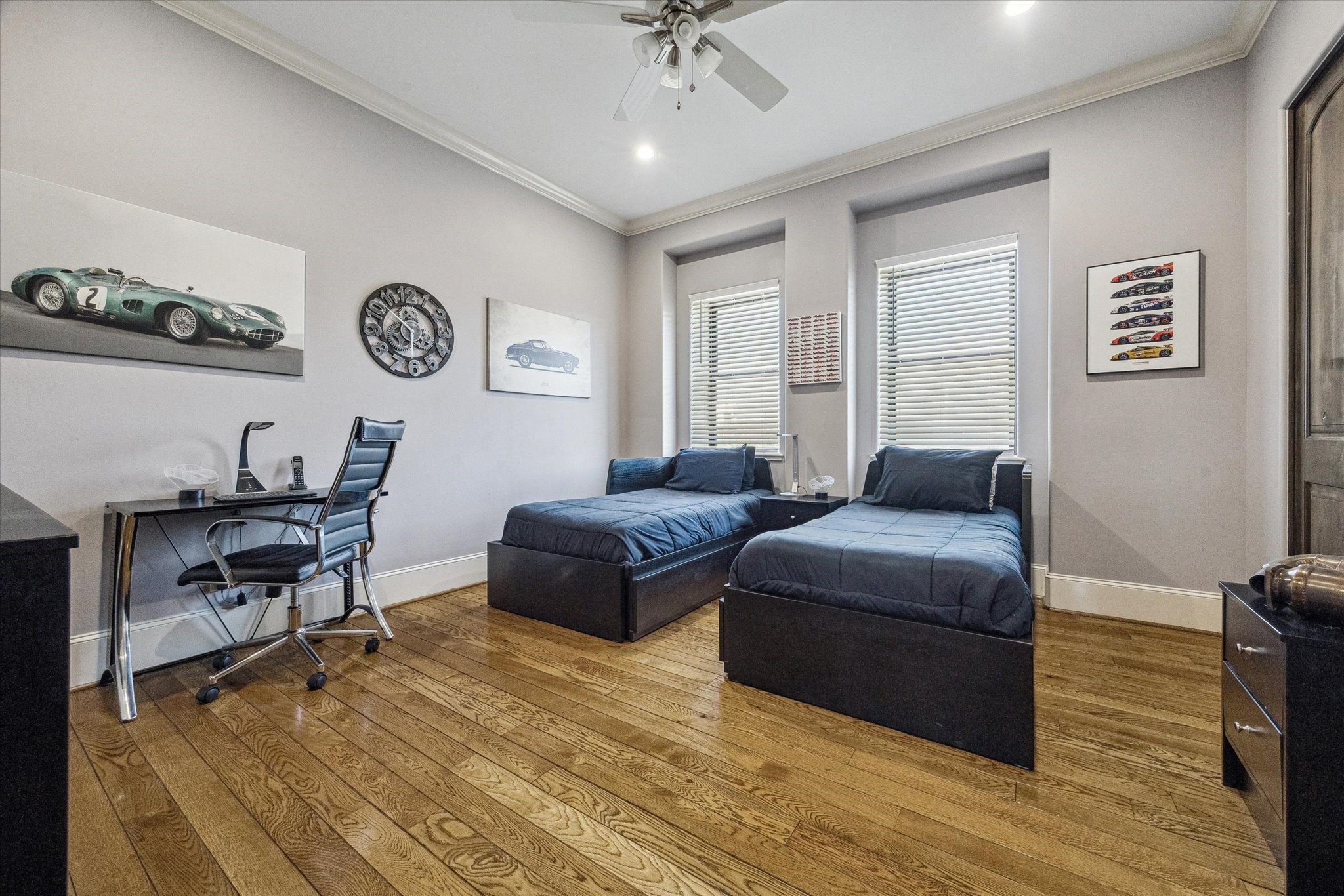 4119 Allen Street Houston, TX 77007 - Photo 30 of 49 a living room with furniture and a clock