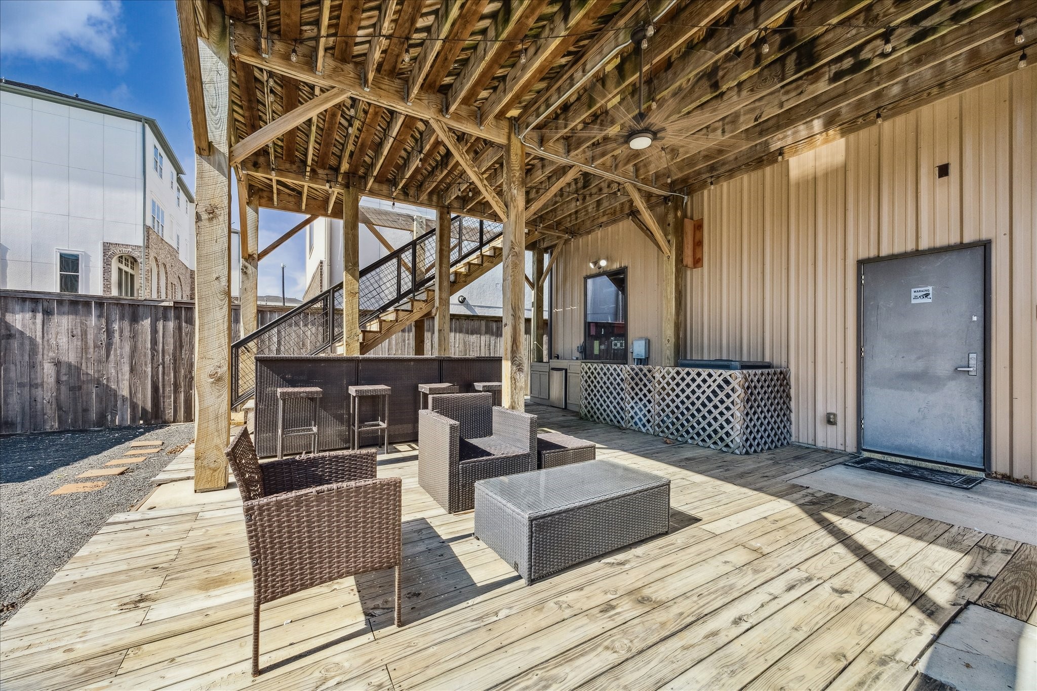 4119 Allen Street Houston, TX 77007 - Photo 38 of 49 a view of a roof deck with wooden floor and fence