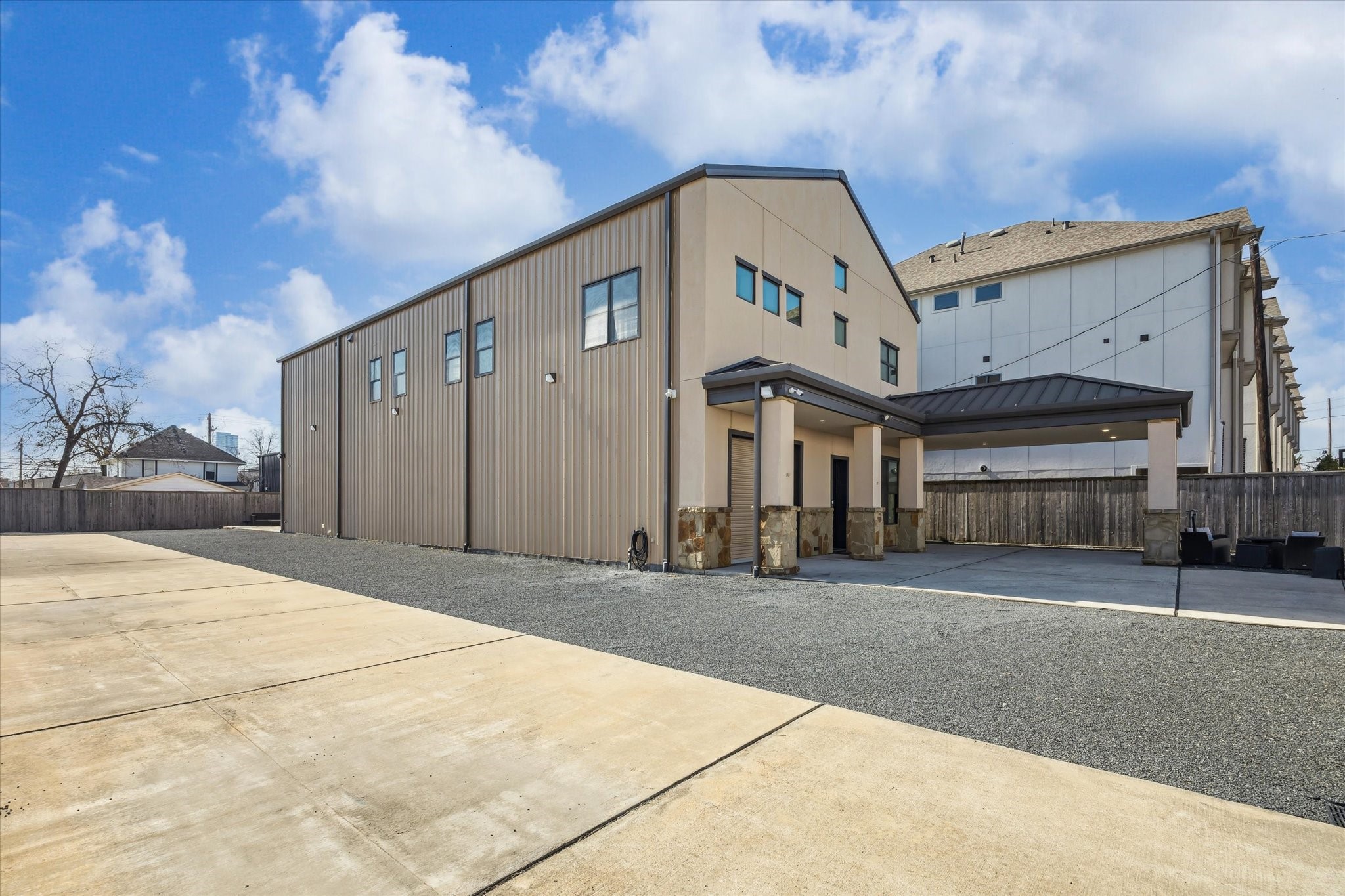 4119 Allen Street Houston, TX 77007 - Photo 48 of 49 a front view of a building with a garden