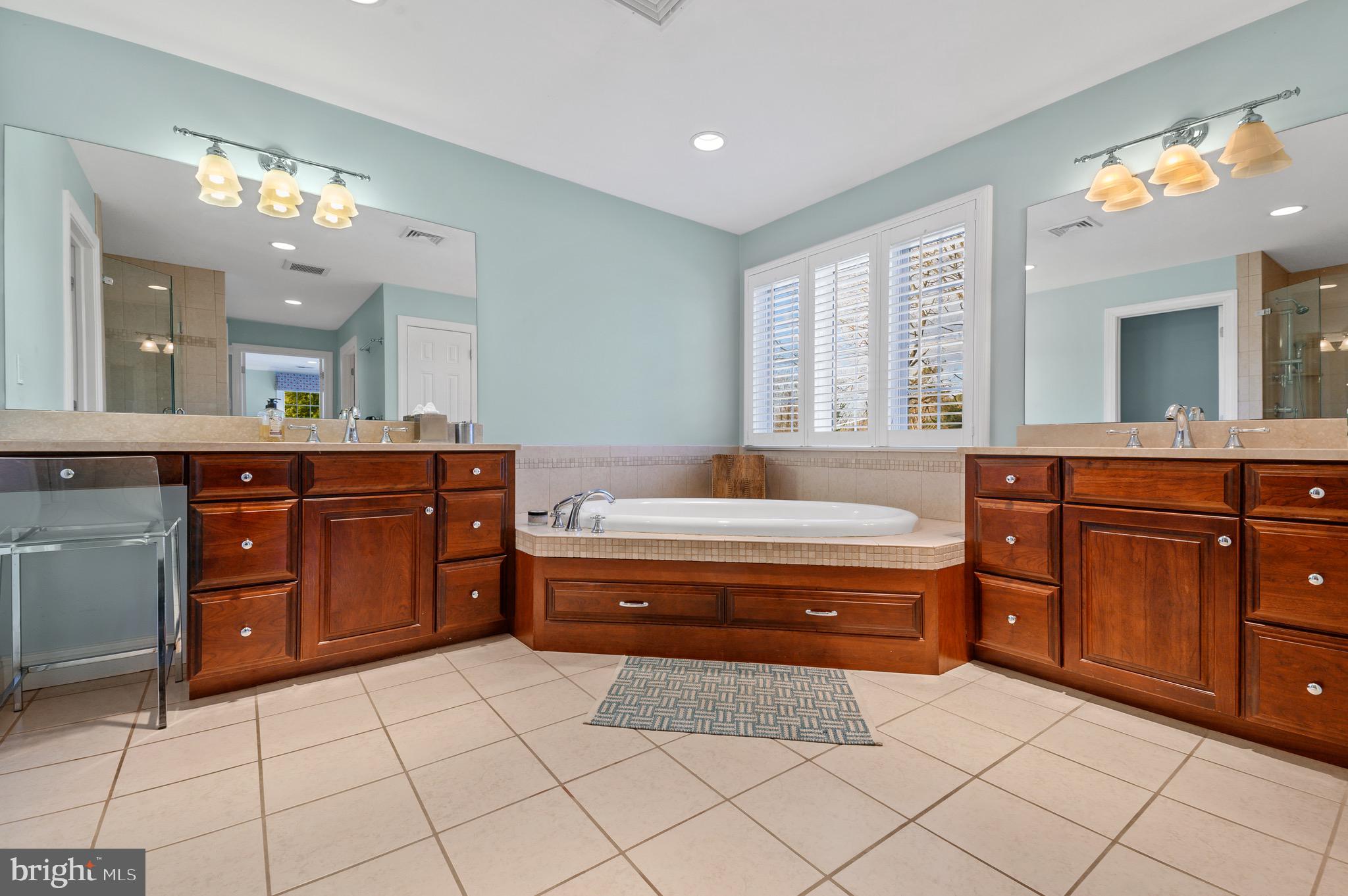333 Exeter Road Devon, PA 19333 - Photo 23 of 39 Master Bath with soaking tub and two vanities