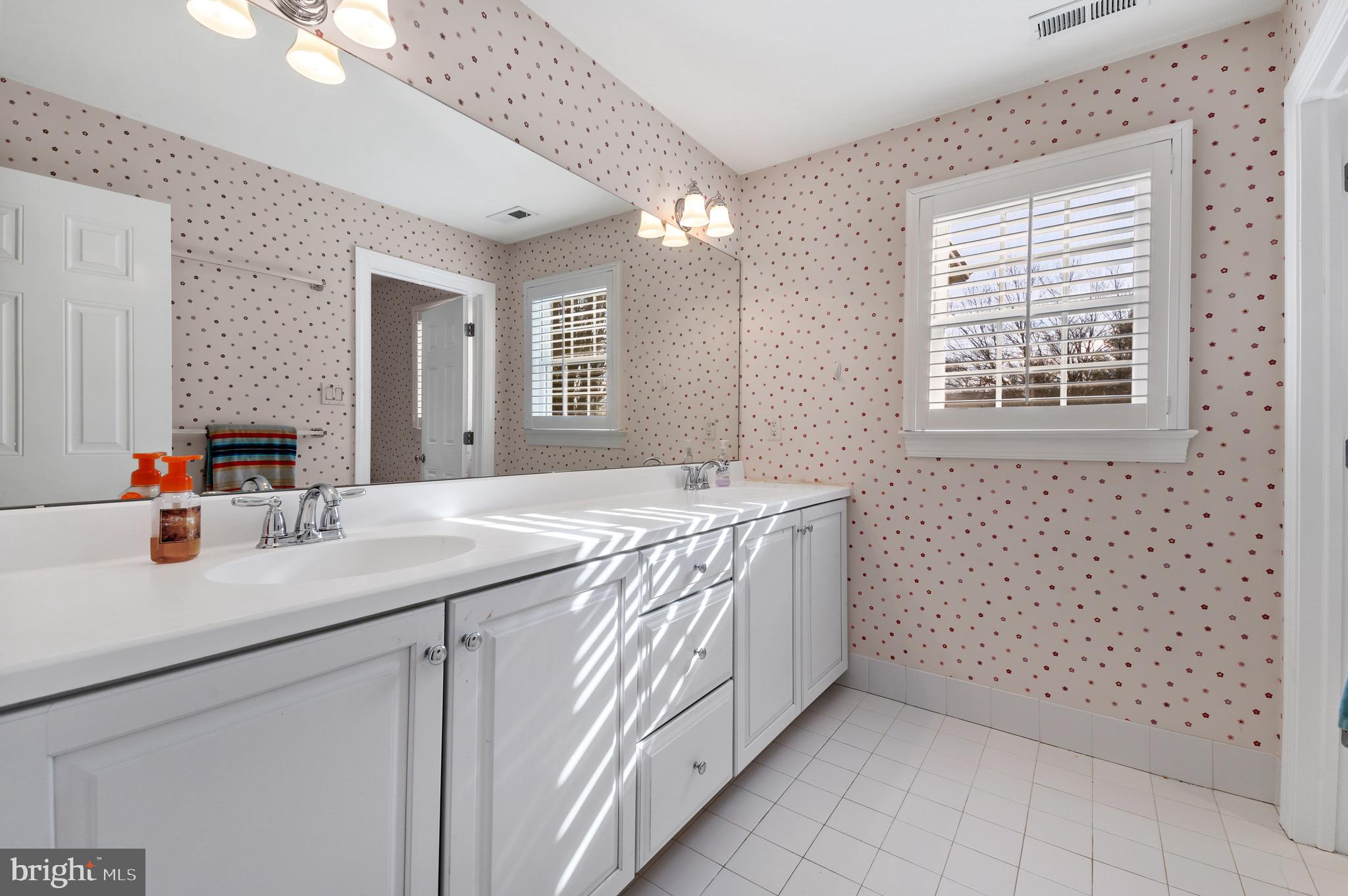 333 Exeter Road Devon, PA 19333 - Photo 26 of 39 Hall Bath with double sinks