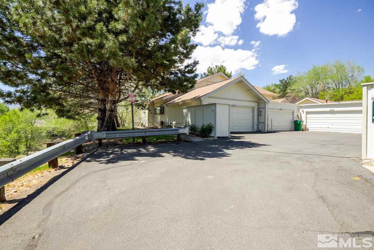 1235 Conway Lane Reno, NV 89503 - Photo 1 of 37 a view of a house with a yard and large tree