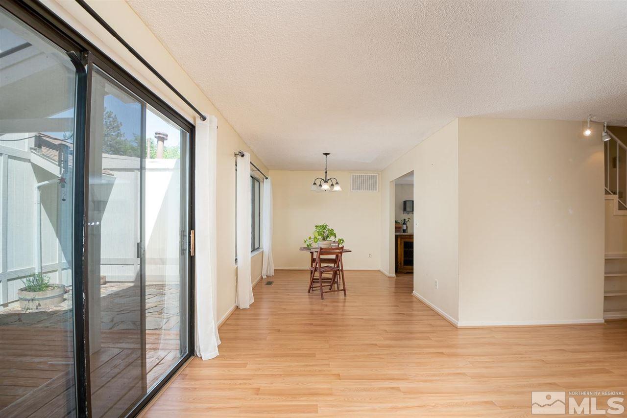 1235 Conway Lane Reno, NV 89503 - Photo 12 of 37 a view of a living room and a wooden floor