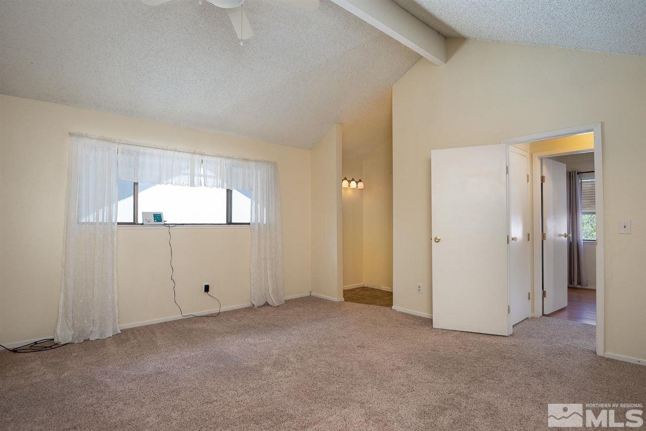 1235 Conway Lane Reno, NV 89503 - Photo 20 of 37 an empty room with closet and windows