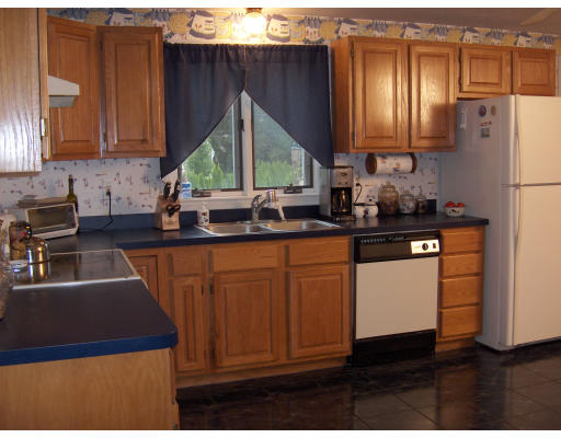 11 Rolling Ridge Road Rutland, MA 01543 - Photo 5 of 11 a kitchen with kitchen island granite countertop a sink cabinets and stainless steel appliances