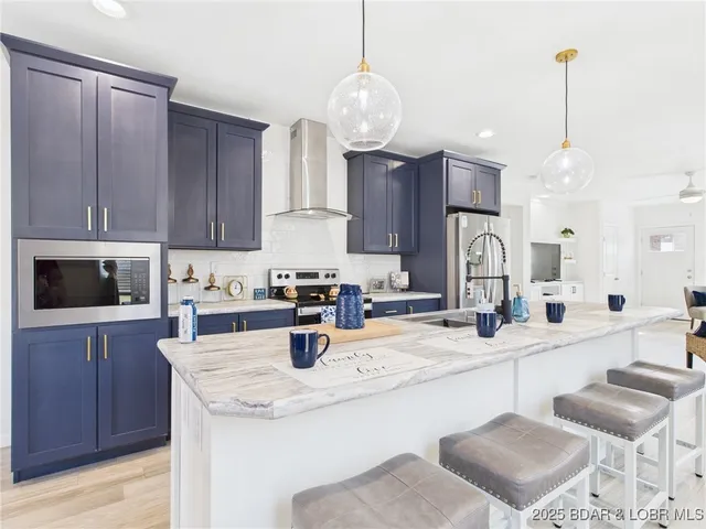 $249,500 | 100 Mayerling Drive, Laurie, MO 65037