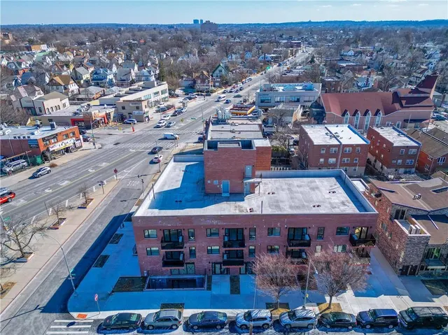 an aerial view of a city with lots of residential buildings