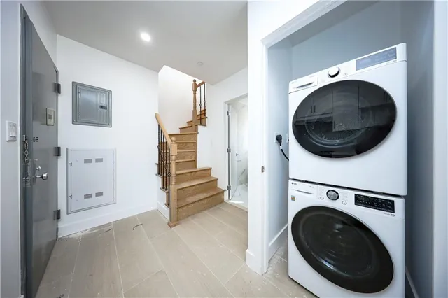 a view of a kitchen with electric appliances