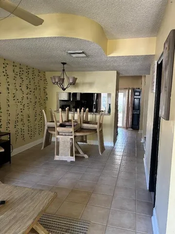 a view of a livingroom with furniture and a couch