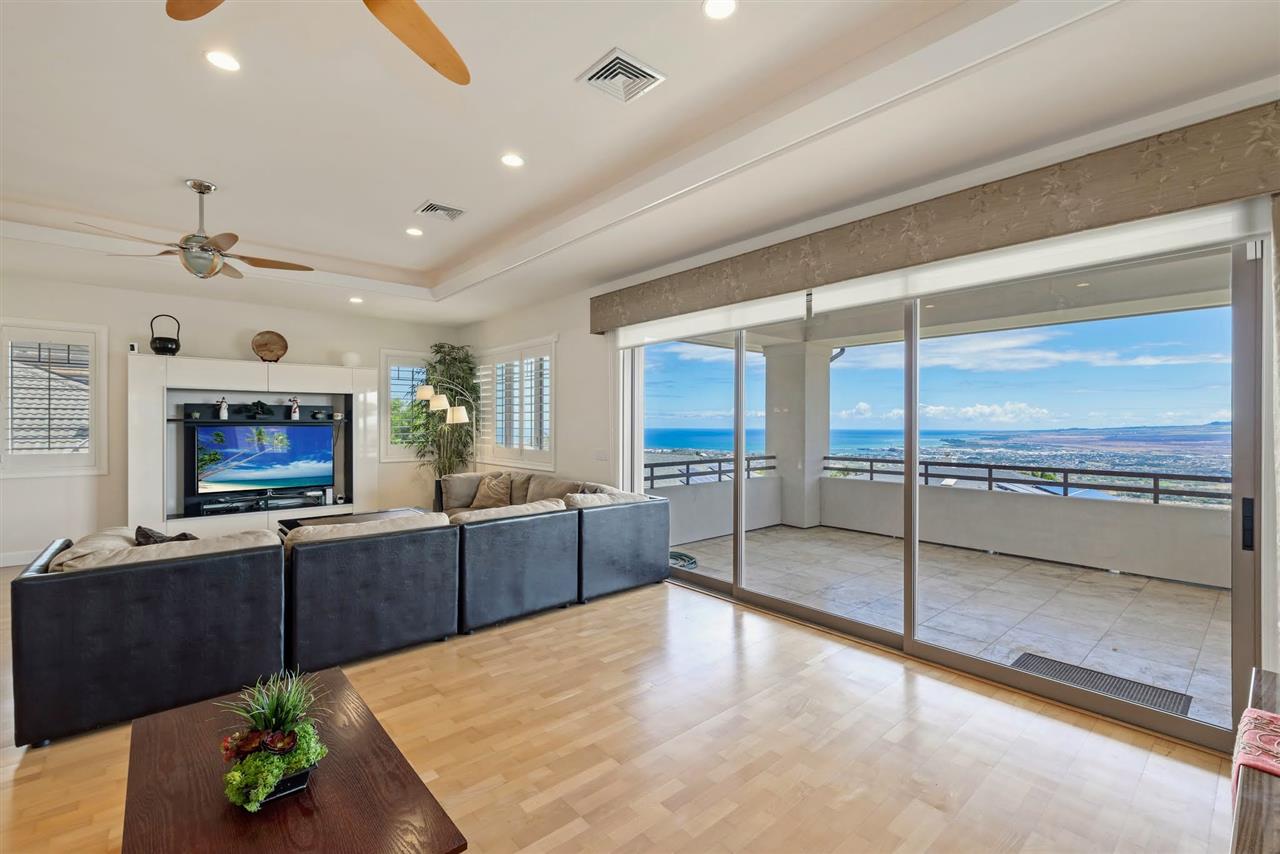 620 Mapuana Place Wailuku, HI 96793 - Photo 8 of 30 a room with furniture and a flat screen tv