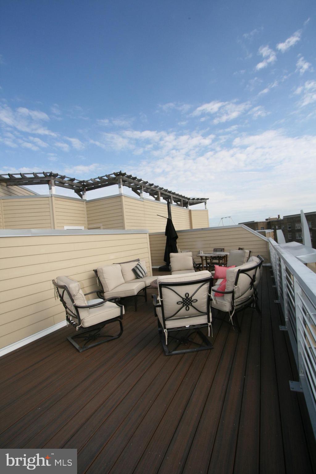 2550 17th Street Northwest, Unit 612 Washington, DC 20009 - Photo 33 of 55 a view of a terrace with seating area