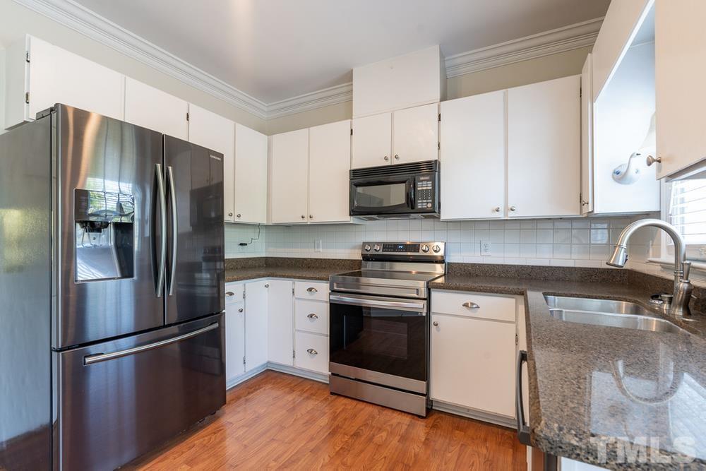 8433 Wycombe Lane Raleigh, NC 27615 - Photo 7 of 30