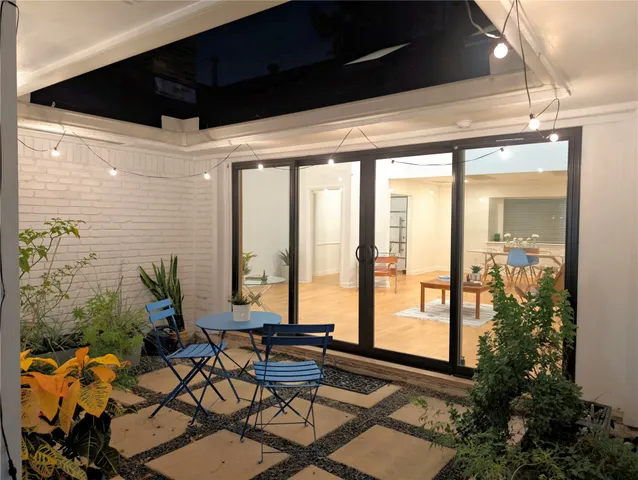 a building outdoor space with patio furniture