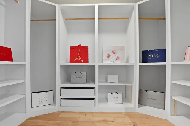 a room with a bed and closet