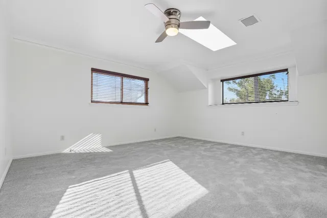 a view of empty room with windows