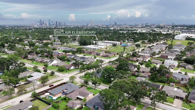 an aerial view of a city with lots of residential buildings