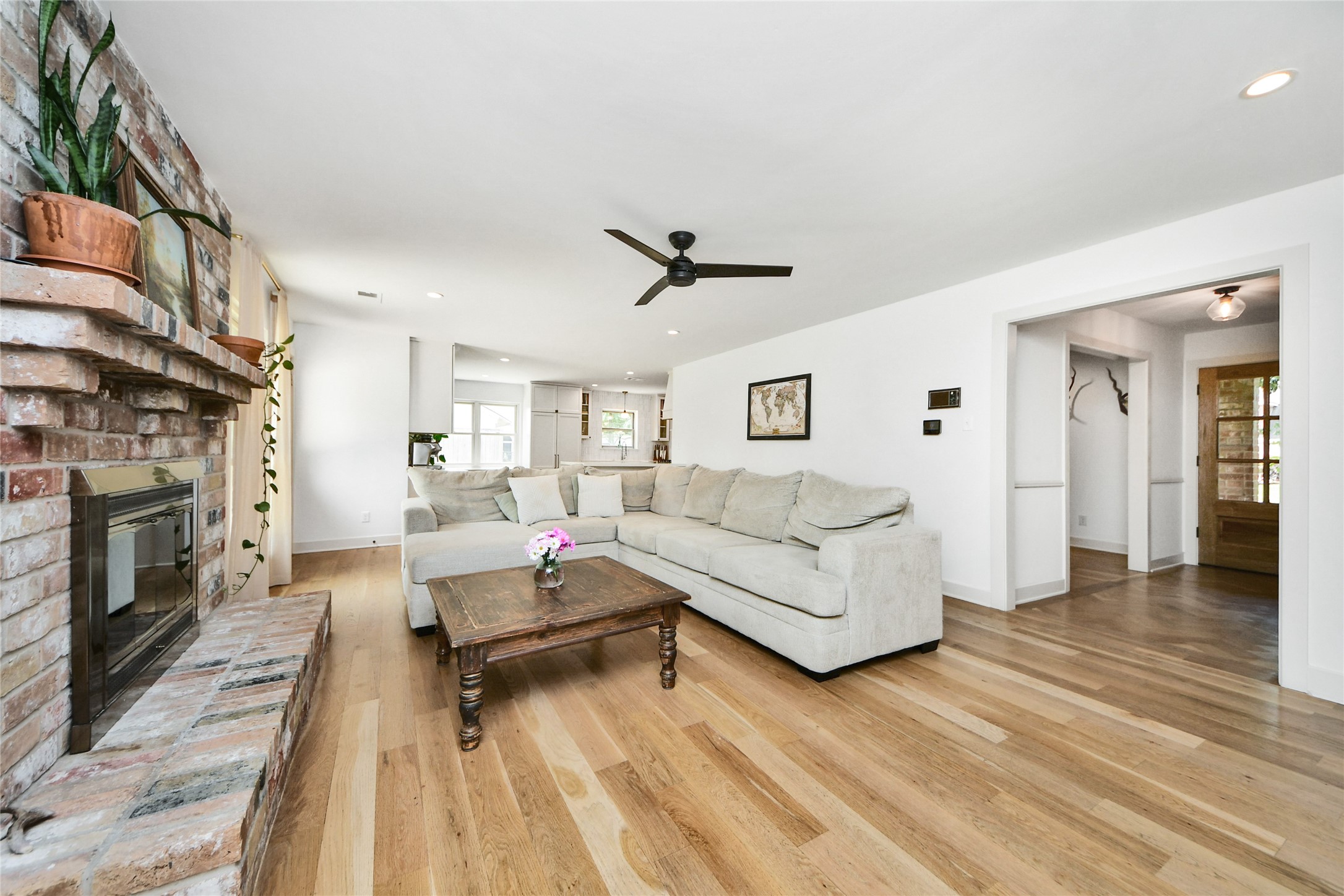 3030 Bernadette Lane Houston, TX 77043 - Photo 4 of 31 a living room with furniture and a fireplace