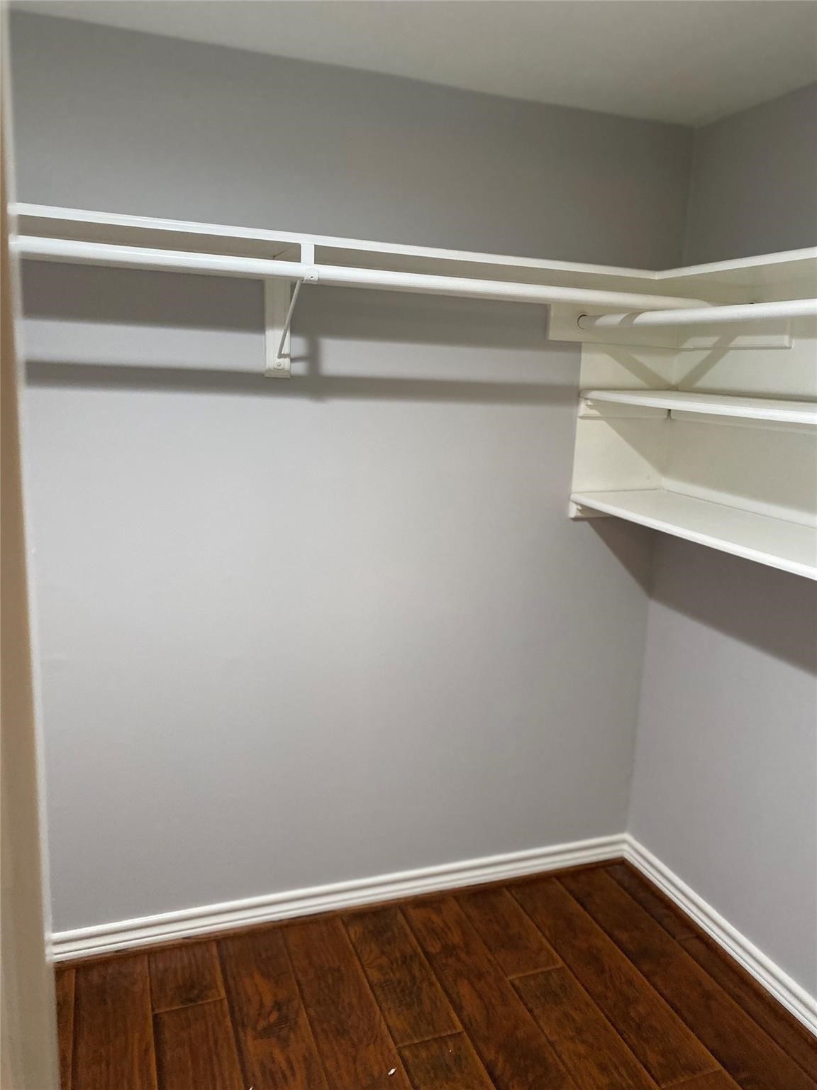 1622 Fall Valley Drive Houston, TX 77077 - Photo 4 of 10 a view of a room with racks on the wall