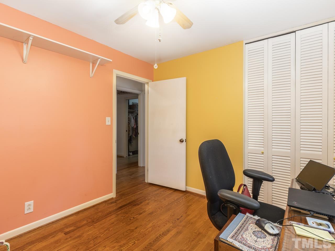 3205 Fairforest Place Raleigh, NC 27604 - Photo 16 of 28 a view of a workspace with furniture and a window