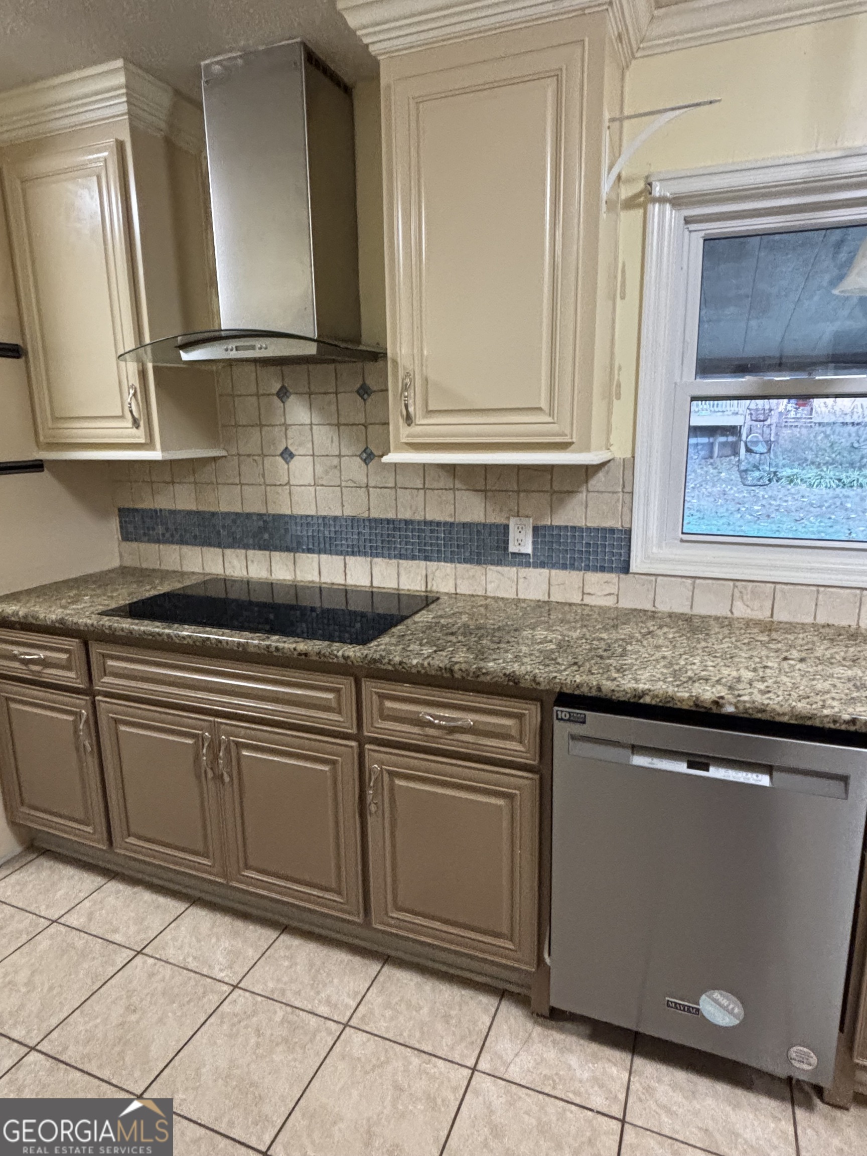 228 Sivell Road LaGrange, GA 30241 - Photo 14 of 64 a kitchen with cabinets and appliances