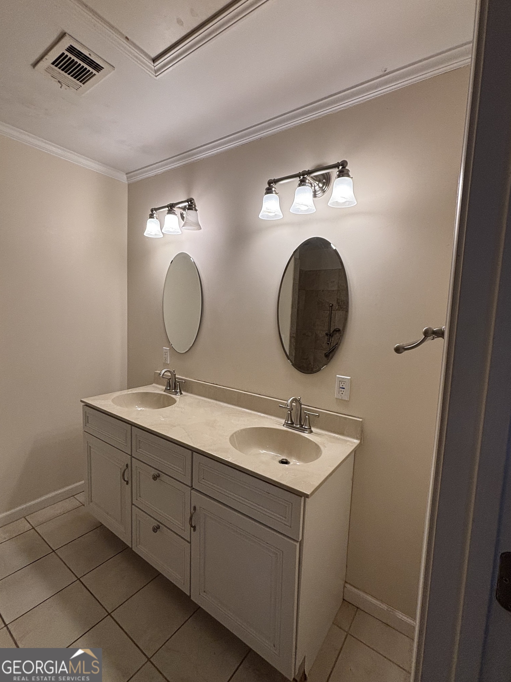 228 Sivell Road LaGrange, GA 30241 - Photo 24 of 64 a bathroom with a double vanity sink and a mirror