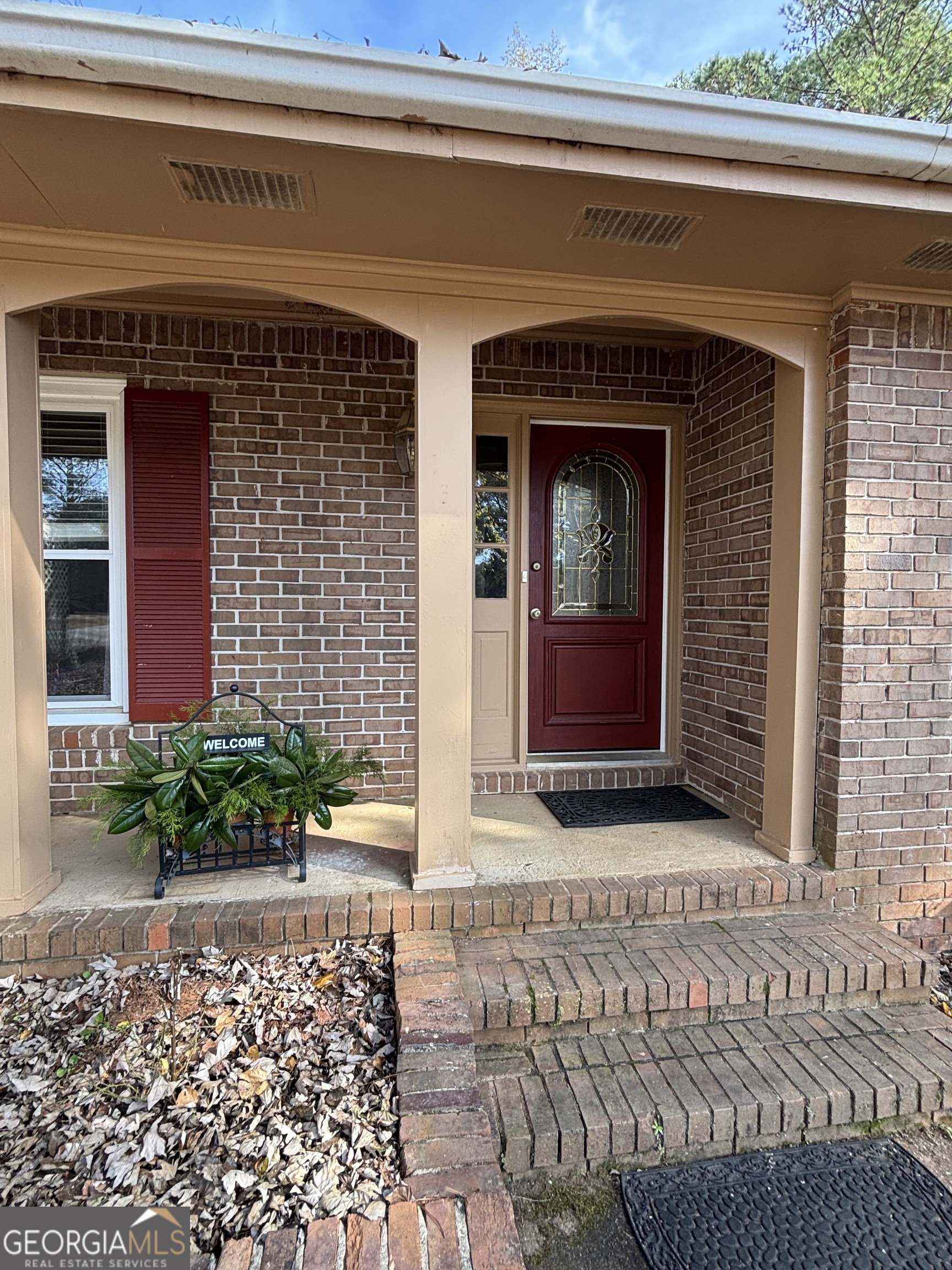 228 Sivell Road LaGrange, GA 30241 - Photo 3 of 64 a front view of a house with garden