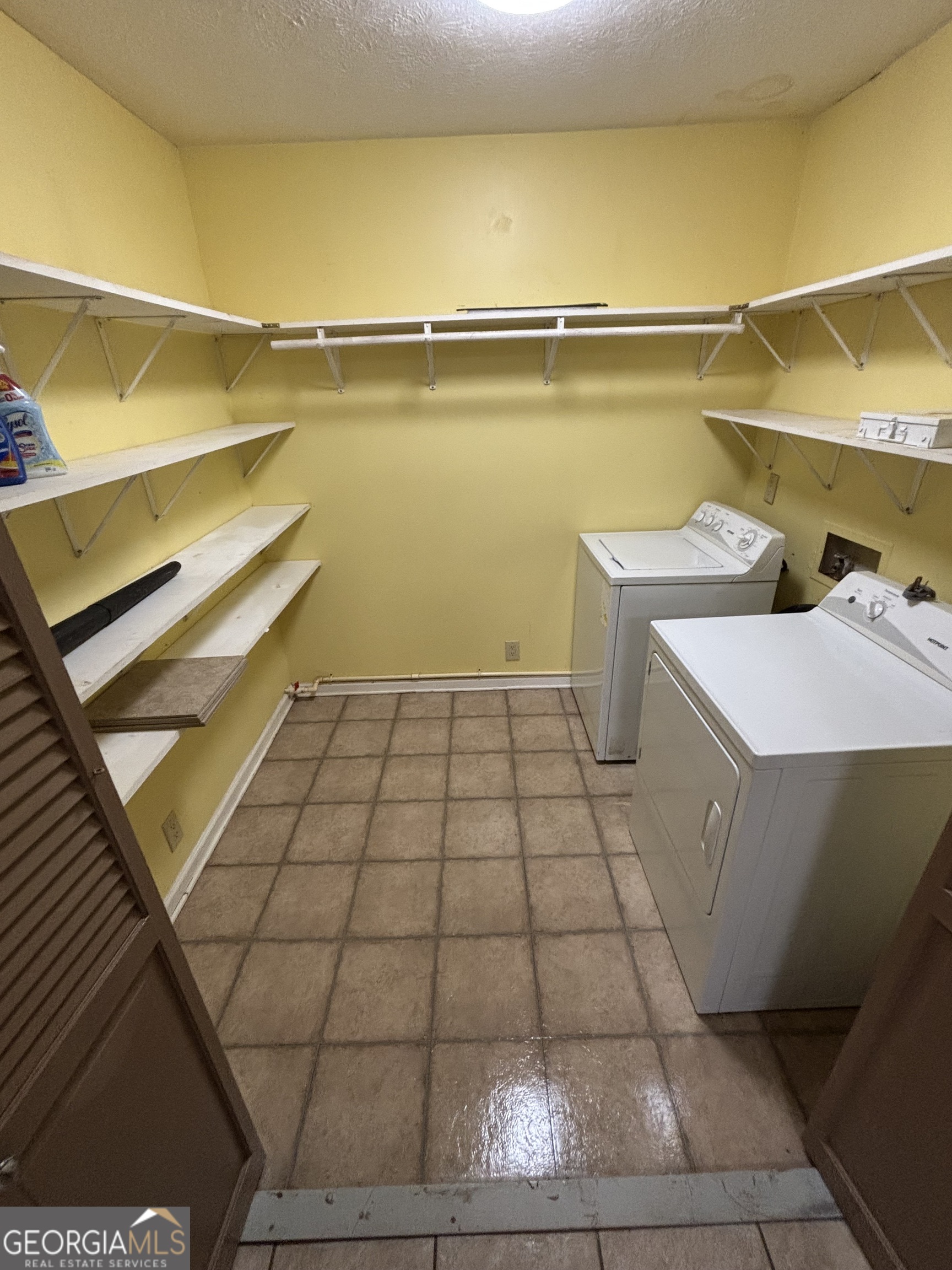 228 Sivell Road LaGrange, GA 30241 - Photo 35 of 64 a view of a bathroom with washing machine