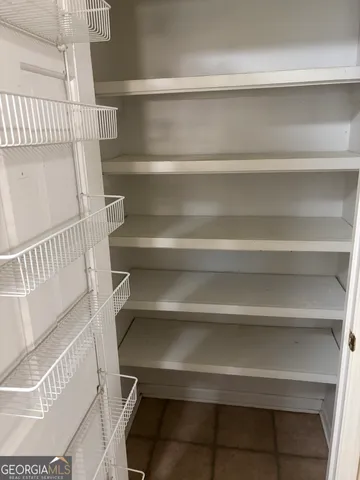 a kitchen with stainless steel appliances granite countertop a sink and a stove