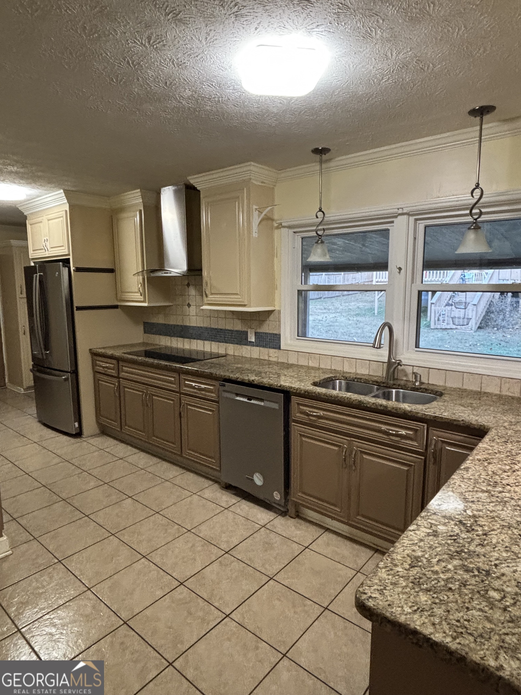 228 Sivell Road LaGrange, GA 30241 - Photo 46 of 64 a kitchen with stainless steel appliances granite countertop a sink and a stove