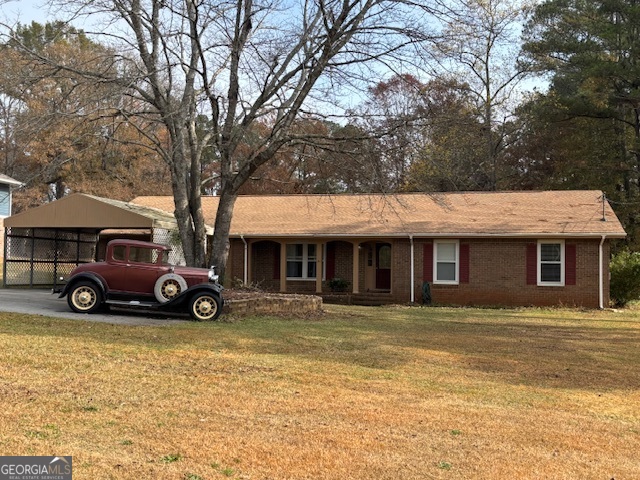 228 Sivell Road LaGrange, GA 30241 - Photo 52 of 64 a car parked in front of a house