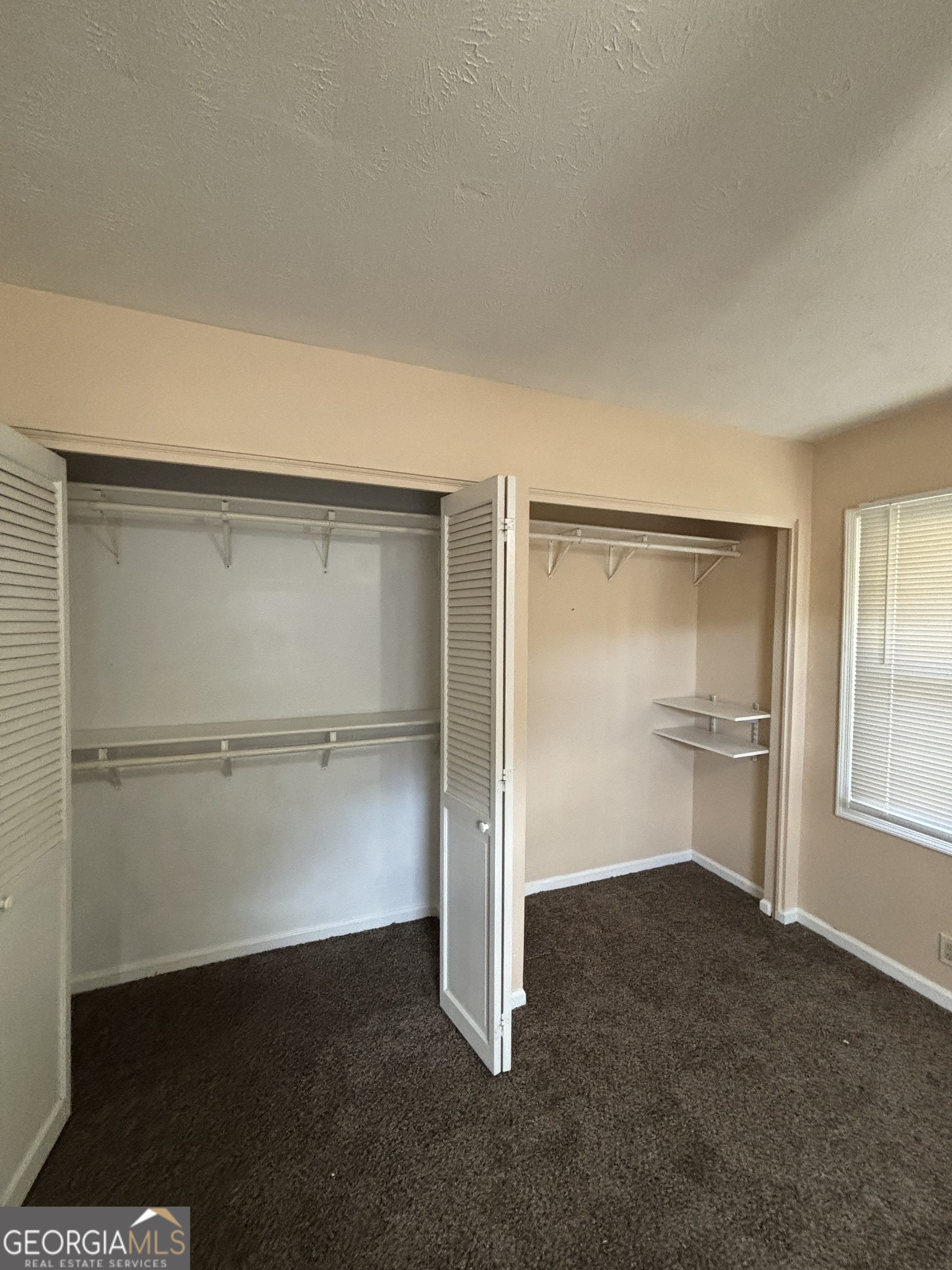 228 Sivell Road LaGrange, GA 30241 - Photo 9 of 64 a view of an empty room and a window