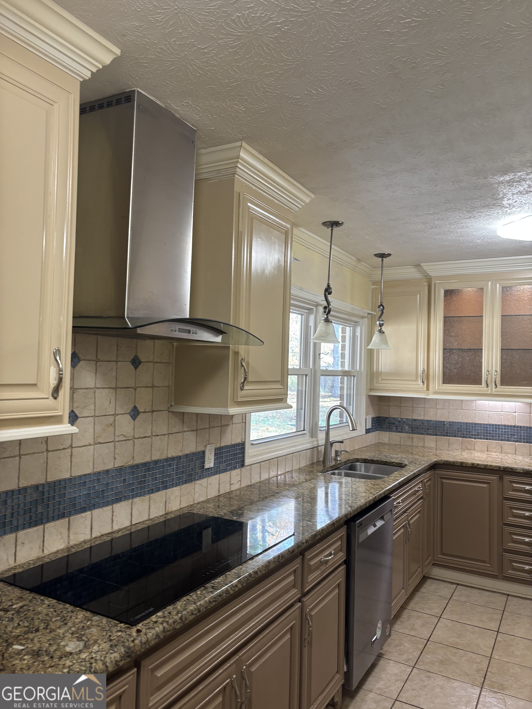 228 Sivell Road LaGrange, GA 30241 - Photo 10 of 64 a kitchen with stainless steel appliances granite countertop a sink and a stove