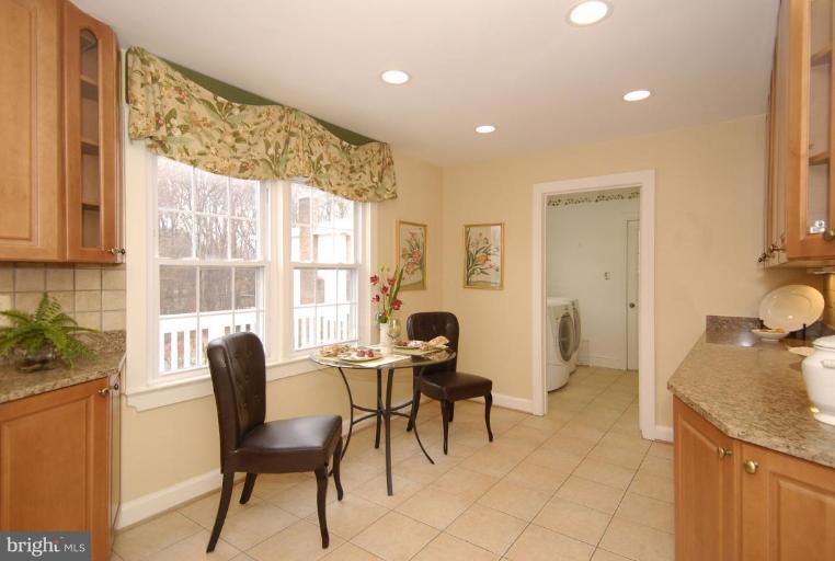 2827 Rifle Ridge Road Oakton, VA 22124 - Photo 5 of 27 a view of a livingroom with furniture and a window
