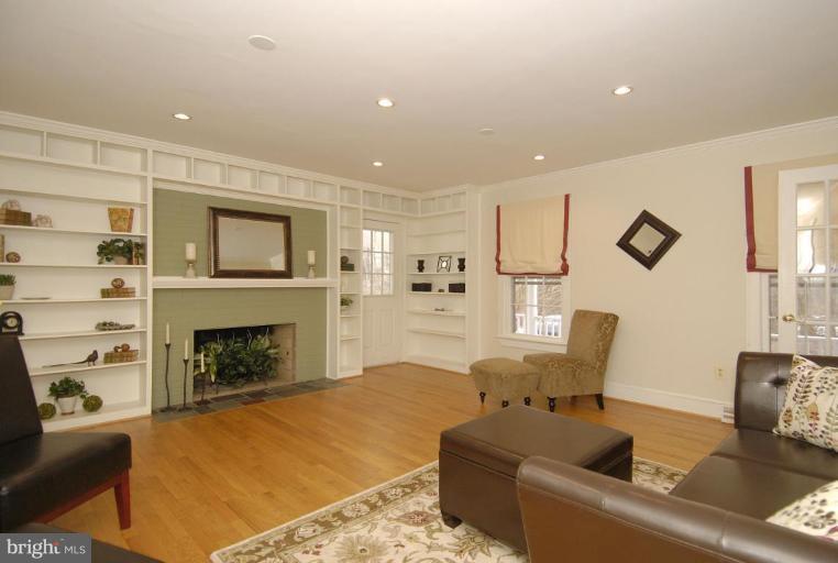 2827 Rifle Ridge Road Oakton, VA 22124 - Photo 6 of 27 a living room with furniture or fireplace and a wooden floor